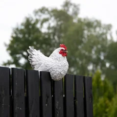 Garden figurine: White hen on a fence