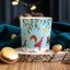 Porcelain mug with 22k gold Winter magic - Skaters 340 ml