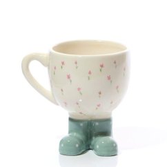 Ceramic mug In shoes