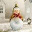 Collectible glass tree ornament Fun in the snow