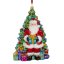 Collectible glass tree ornament Santa by the Christmas tree
